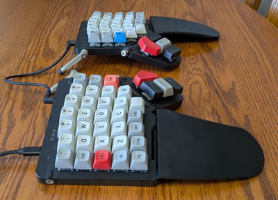 My ZSA Moonlander split keyboard with custom keycaps